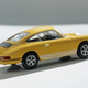 Illustration for article titled Tomica Limited Vintage 1/64 #3 - Projekt RennSport Käfer #7 - 1973 Porsche 911s